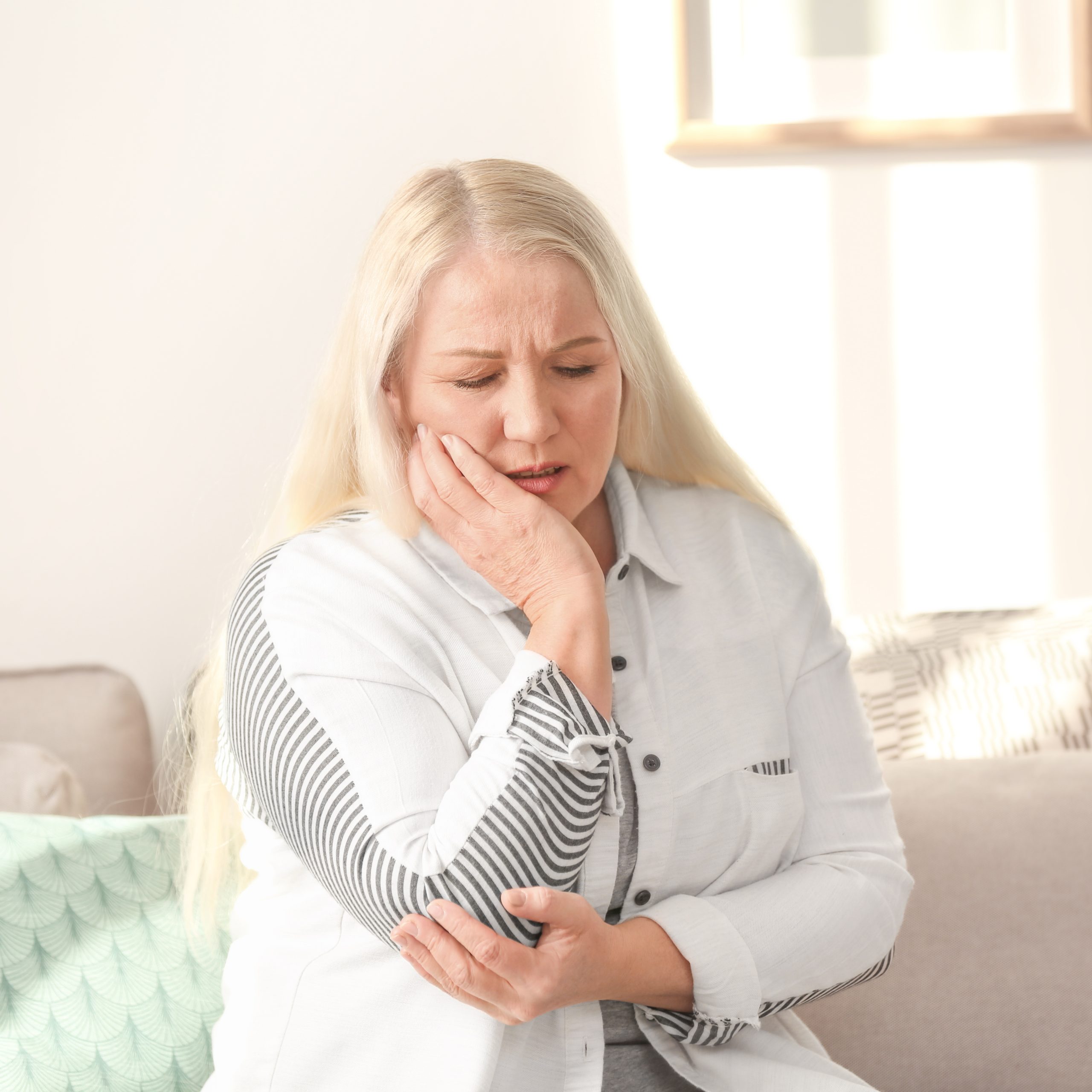 Mature,Woman,Suffering,From,Toothache,At,Home
